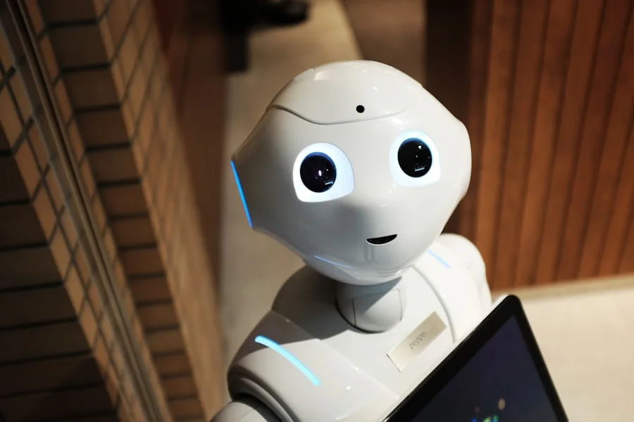 Robot putih dan manusia bekerja sama merepresentasikan kolaborasi antara developer dan AI dalam membangun aplikasi